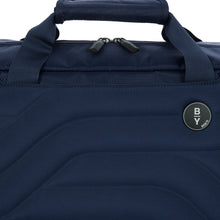 Load image into Gallery viewer, Close up to the front panel and handles of the duffle bag.
