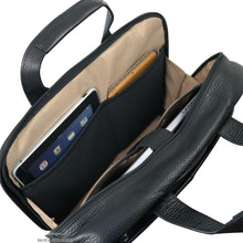 Load image into Gallery viewer, Interior view of the briefcase, featuring tan lining, tablet, and laptop compartments. 
