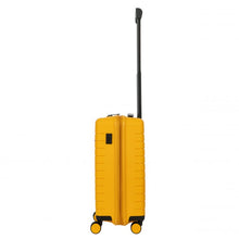 Load image into Gallery viewer, Side view of the mango yellow hard shell suitcase with black accents. The telescopic handle is pulled up.
