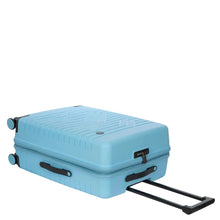 Load image into Gallery viewer, The light blue suitcase laid on its back with the expandable handle pulled. The top, side, and front panels are shown. 
