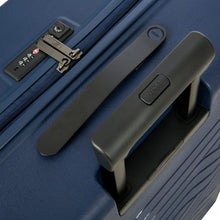 Load image into Gallery viewer, Close up to the top of the navy blue suitcase. The view shows the telescopic handle, grabbing handle, and a three digit combination lock. 

