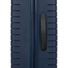 Load image into Gallery viewer, Close up to the side of the navy blue hard shell suitcase. The black handle on it offers an easy grabbing area.
