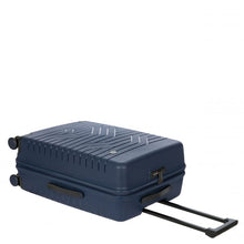 Load image into Gallery viewer, A navy blue suitcase laid on its back with the telescopic handle pulled. The top, side, and front panels are shown. 

