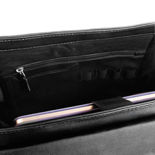 Load image into Gallery viewer, Interior close up of the black briefcase. It features dedicated compartments for four pens and a cellphone, and one zipper-closing pocket.
