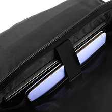 Load image into Gallery viewer, Interior close of the black briefcase. A laptop and tablet are arranged inside the compartments.
