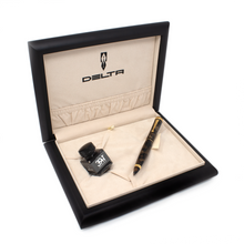 Load image into Gallery viewer, The fountain pen and ink bottle arranged in the opened presentation box.
