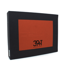 Load image into Gallery viewer, Angled front view of the outer box. 
