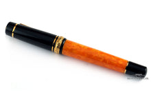 Load image into Gallery viewer, Back view of the fountain pen with the cap on.
