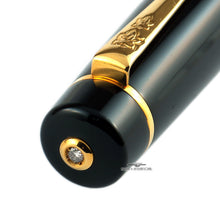Load image into Gallery viewer, Angled close up to the gold ring and diamond at the top of the cap.
