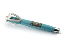Load image into Gallery viewer, The blue rollerball pen with the cap on. 

