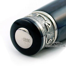 Load image into Gallery viewer, Angled close up to the bottom of the pen. it has a silver disk with 1930 engraved on it.

