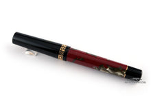 Load image into Gallery viewer, Back view of the fountain pen with the cap on. 
