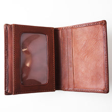Load image into Gallery viewer, Interior view of the tan leather wallet, featuring a windowed ID slot.
