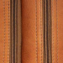 Load image into Gallery viewer, Top close up to the two zippers on the tan leather toiletry bag.
