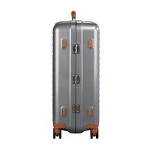 Load image into Gallery viewer, Side panel view of the suitcase. It features four stub legs to sit the suitcase on its side. 
