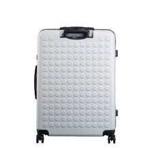 Load image into Gallery viewer, Back panel view of the white suitcase with black accents. 
