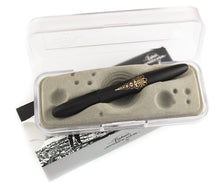 Load image into Gallery viewer, The matte black Caduceus pen arranged in the packaging. 
