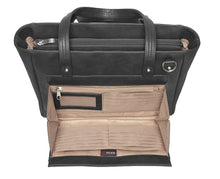 Load image into Gallery viewer, Angled front view of the black leather bag with the front compartment opened. It features RFID protection, multiple credit card slots, an windowed ID slot, and a zipper-closing pocket.
