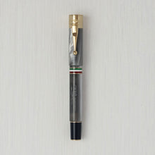 Load image into Gallery viewer, Front view of the Perla fountain pen with golden trims.

