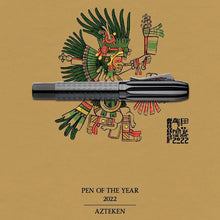 Load image into Gallery viewer, The 2022 Pen of the year set in front of a a design inspired by Aztec culture, and the 2022 Pen of the Year logo.
