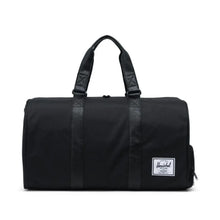 Load image into Gallery viewer, Front panel view of the black duffle bag. 
