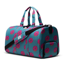 Load image into Gallery viewer, Herschel Supply Novel Duffle Simpsons - Homer Simpson - Blue Duffle with Donuts - Angled View
