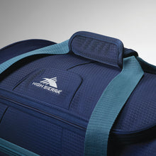 Load image into Gallery viewer, Top panel close up to the navy blue duffle bag's handle straps.
