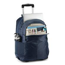 Load image into Gallery viewer, Angled front panel view of the blue wheeled backpack with stationery, accessories, electronics, and a water bottle organized in the compartments.
