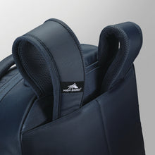 Load image into Gallery viewer, Close up to the shoulder straps tucked in the back panel on the indigo blue backpack. 
