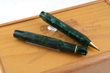 Load image into Gallery viewer, The ballpoint and fountain pen set on top of the wooden presentation box.
