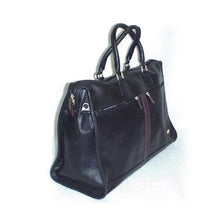 Load image into Gallery viewer, Angled view of the black leather satchel bag.
