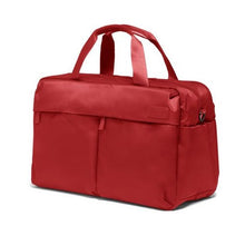 Load image into Gallery viewer, Angled front view of the cherry red duffel bag. 
