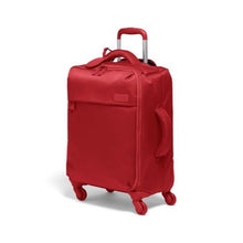 Load image into Gallery viewer, Angled front view of the cherry red suitcase. It features a grab handle on the side panel.
