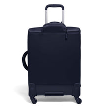 Load image into Gallery viewer, Back panel view of the black suitcase with the telescopic handle extended. 
