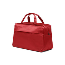 Load image into Gallery viewer, Angled front view of the red duffle bag.
