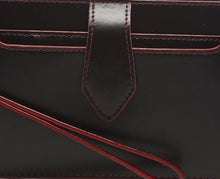 Load image into Gallery viewer, Close up to the black clutch wallet. 
