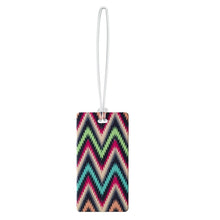 Load image into Gallery viewer, A chevron patterned luggage tag with a zig-zag pattern.
