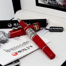 Load image into Gallery viewer, The red rollerball pen in the presentation box
