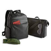 Load image into Gallery viewer, A black leather backpack and briefcase arranged on a white background with accessories. 
