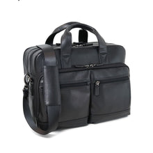 Load image into Gallery viewer, Angled front panel view of the briefcase with the shoulder strap leaning on the top panel. 
