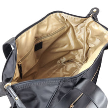 Load image into Gallery viewer, Interior view, featuring zipper-closing pockets. 
