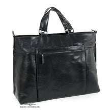 Load image into Gallery viewer, Angled front view of the black leather bag with the grab handle extended.
