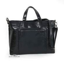 Load image into Gallery viewer, Front view of the black leather bag with a detachable shoulder strap.
