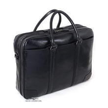 Load image into Gallery viewer, Angled back panel view of the black briefcase. It features a panel pocket. 
