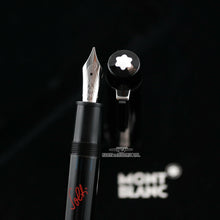 Load image into Gallery viewer, Close up to the fountain pen nib an top of the cap.
