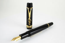 Load image into Gallery viewer, Angled view of the fountain pen cap and pen. 
