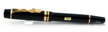 Load image into Gallery viewer, Side view of the fountain pen with the cap on.
