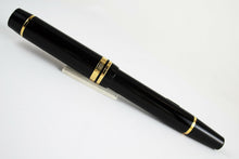 Load image into Gallery viewer, Back view of the fountain pen with the cap on.

