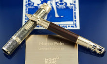 Load image into Gallery viewer, The fountain pen nib resting on the cap.
