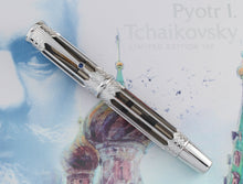 Load image into Gallery viewer, Front view of the fountain pen with the cap on. Set on the card stock box.
